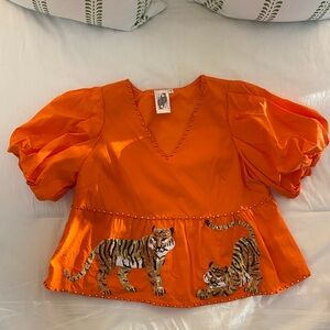 Queen of Sparkles Orange Tiger Peplum Top